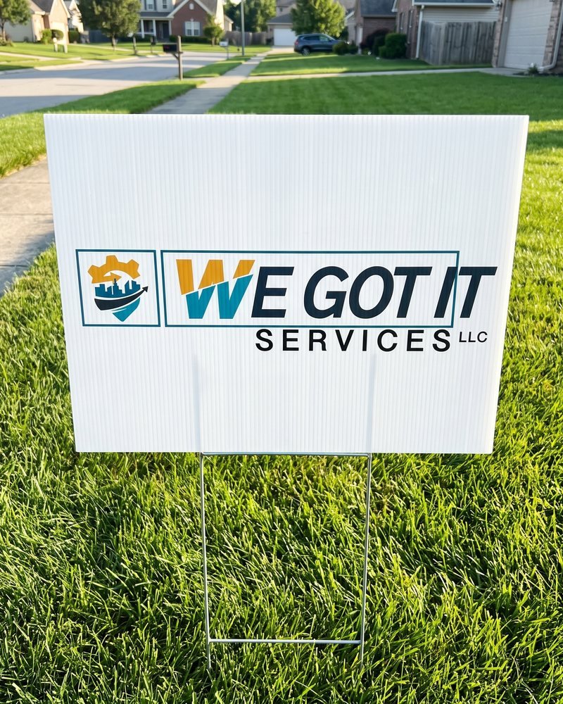 Mockup of the We Got It Services logo on a lawn yard sign